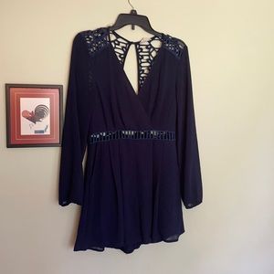 Crescent long sleeved romper